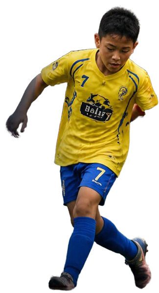 Young footballer in yellow club kit running
